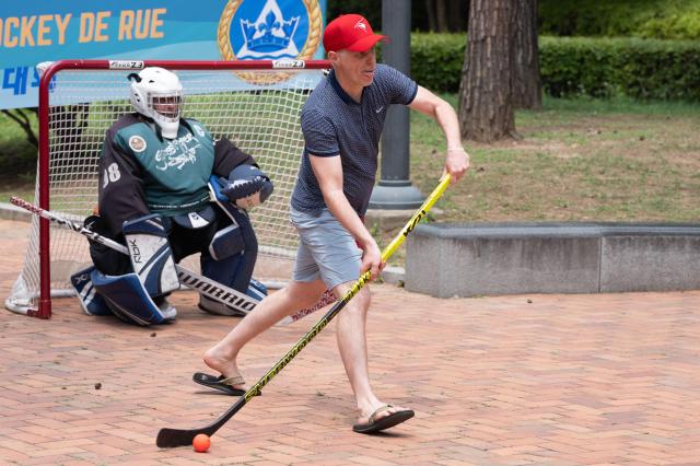 Canadian player dribbling puck at Jeongdong Park in central Seoul July 1 2024 AJU PRESS Park Jong-hyeok