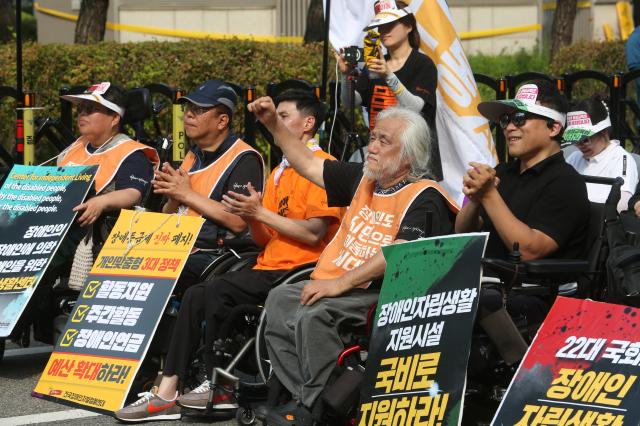 Representative Park Kyung-suk raises a fist during the Move Toward Parade organized by SADD in front of the National Assembly on July 1 2024 AJU PRESS Han Jun-gu