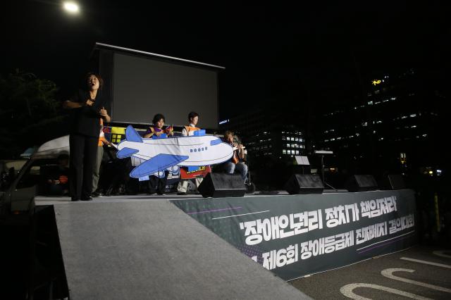 Protesters perform during the Move Toward Parade organized by SADD in front of the National Assembly on July 1 2024 AJU PRESS Han Jun-gu