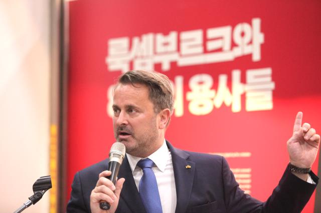 Deputy prime minister of Luxembourg and as the minister for Foreign Affairs Xavier Bettel gives a conglatultory message at an opening ceremony of the exhibition 