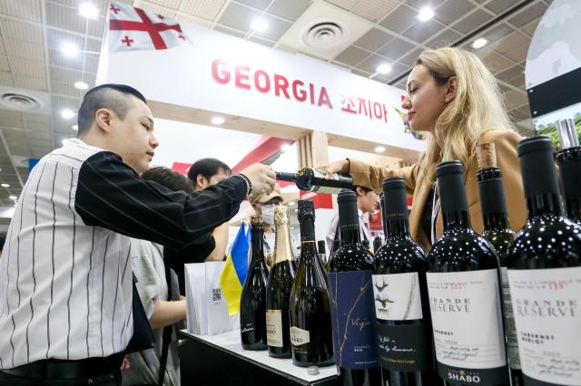 A visitor are tasting wine at Seoul International Wine  Spirits Expo at COEX in Seoul on July 4 2024 AJU PRESS Kim Dong-woo