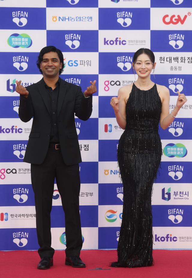 Anupam Tripathi and Kwak Su-jin pose at the photo wall during the 28th Bucheon International Fantastic Film Festival in Gyeonggi Province on July 4 2024 AJU PRESS Han Jun-gu