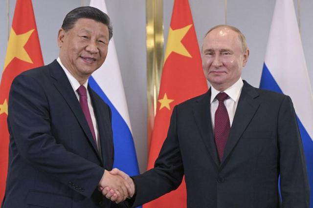 Opinion: Xi, Putin talk up growth of their Eurasian bloc organization as counterweight to NATO