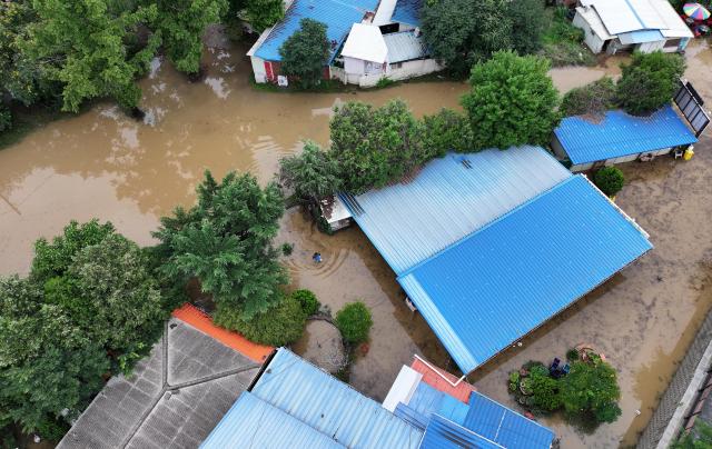 Four dead, one missing as heavy rains swept central Korea