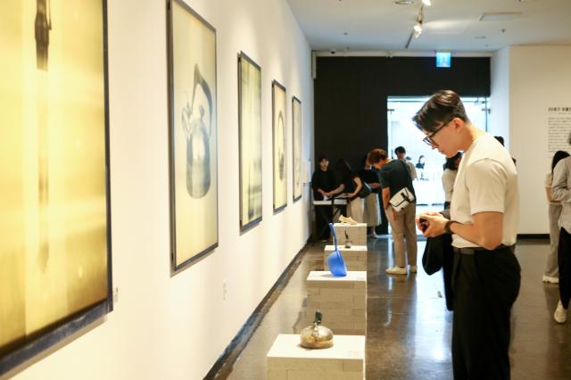 A visitor views exhibits at the 22nd Century Relic Exhibition at Dream Forest Art Center in Seoul on July 11 2024 AJU PRESS Kim Dong-woo