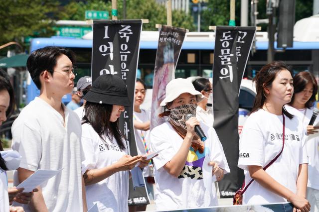 Members of Animal Liberation Wave participate in the 2024 Boknal Memorial Action in front of Bosingak Pavilion Seoul on July 15 2024 The event protests the traditional consumption of samgyetang a chicken soup dish during Koreas hottest summer days citing animal welfare concerns AJU PRESS Park Jong-hyeok