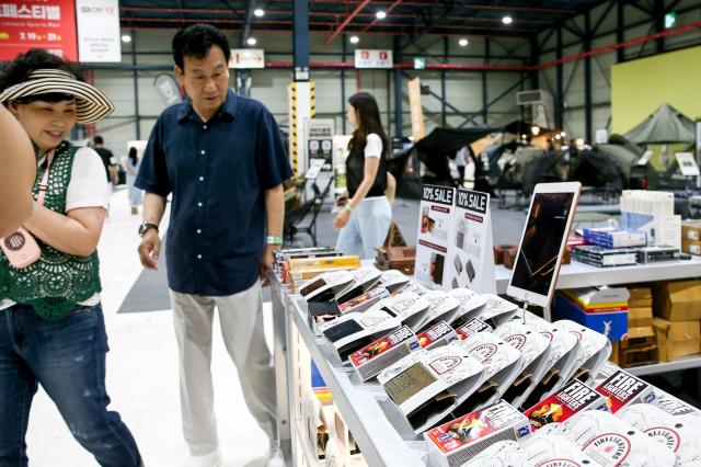 Visitors look around an exhibition at Global Outdoor Camping  Leisure Sports Fair at SETEC in Gangnam Seoul on 19 July 2024 AJU PRESS Kim Dong-woo