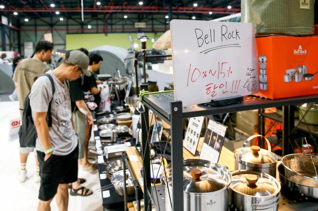 Visitor looks at items on display at Global Outdoor Camping  Leisure Sports Fair at SETEC in Gangnam Seoul on 19 July 2024 AJU PRESS Kim Dong-woo