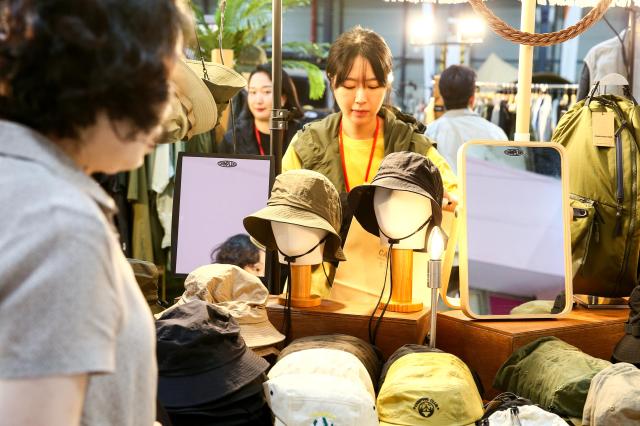 A visitor looks at items on display at Global Outdoor Camping  Leisure Sports Fair at SETEC in Gangnam Seoul on 19 July 2024 AJU PRESS Kim Dong-woo