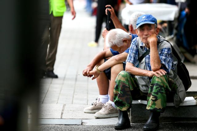 Senior citizens sit and rest at Pagoda Park in Jongno-gu Seoul on July 23 2024 AJU PRESS Kim Dong-woo
