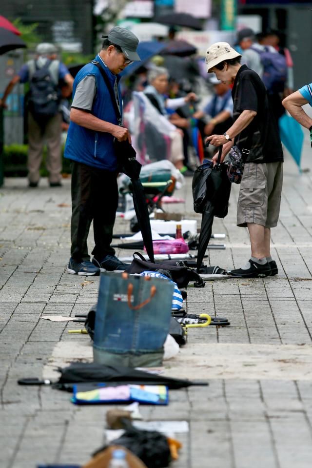 Senior citizens queue to receive free meals at Pagoda Park in Jongno-gu Seoul on July 23 2024 AJU PRESS Kim Dong-woo