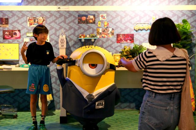 Visitors take a photo at the IMAX cinema in Yongsan Seoul on 24 July 2024 AJU PRESS Kim Dong-woo