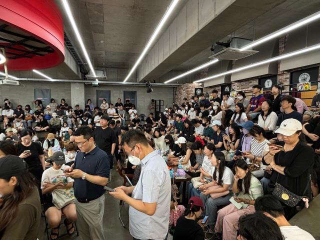 People wait for refunds at WeMakePrice headquarters in Gangnam-gu Seoul July 25 2024 AJU PRESS Han Jun-gu