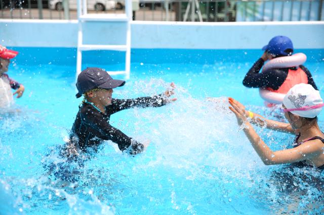 Kids splash water at the 2024 Seoul Summer Beach in Gwanghwamun Square Seoul on July 26 2024 AJU PRESS Han Jun-gu