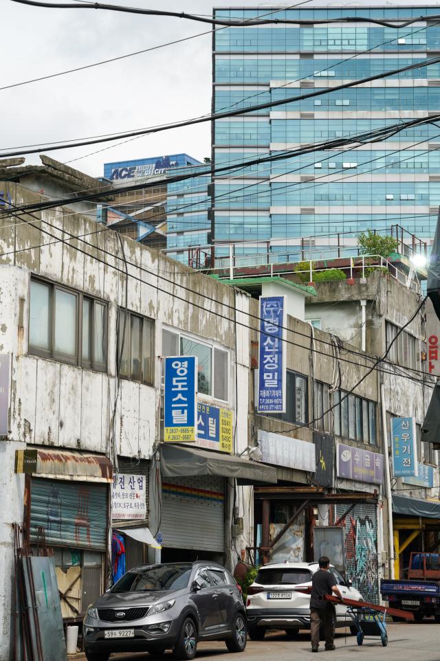 Metalworking shops in Seouls Mullae Art Village on July 25 2024 In the background knowledge industry center can be seen AJU PRESS Park Jong-hyeok