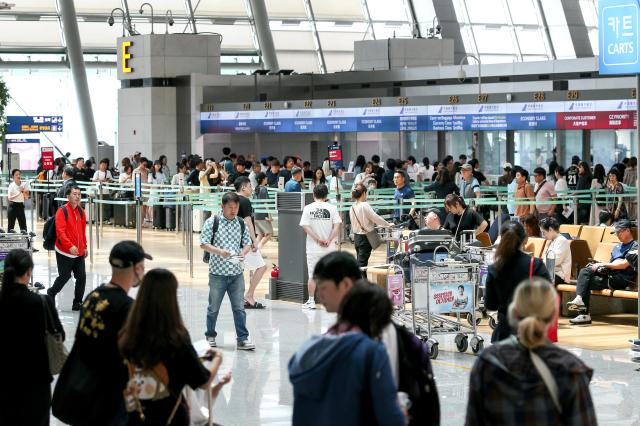 Travelers wait for departure at Incheon International Airport Terminal 1 on July 26 2024 AJU PRESS Kim Dong-woo