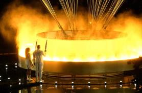 PHOTOS: Paris kicks off Olympics with outdoor spectacle despite glitches