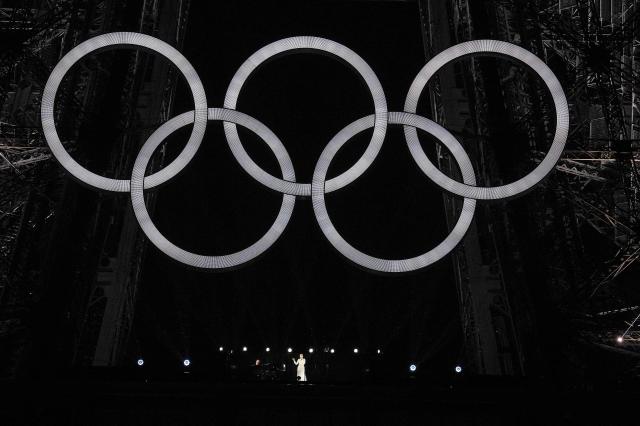 Canadian singer Celine Dion performs on the Eiffel Tower  during the opening ceremony of the Paris 2024 Olympic Games in Paris on July 26 2024 AFPYonhap