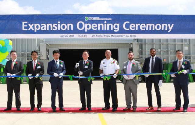 HD Hyundai Electric CEO Cho Seok center left celebrates the expansion of its plant in Alabama USA on July 26 2024 