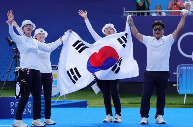 Team South Korea celebrates winning the Women Team Gold Medal match against China of the Archery competitions in the Paris 2024 Olympic Games at the Invalides in Paris France 28 July 2024 EPA-Yonhap