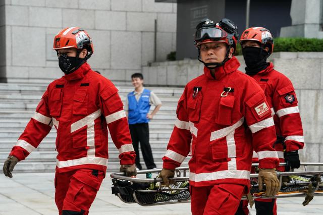 Special rescue firefighters enter the scene during Seouls earthquake response drill at Sejong Center for the Performing Arts next to Gwanghwamun Plaza on July 29 2024 AJU PRESS Park Jong-hyeok