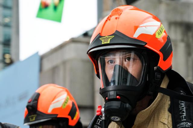 A firefighter participates in Seouls earthquake response drill at Sejong Center for the Performing Arts next to Gwanghwamun Plaza on July 29 2024 AJU PRESS Park Jong-hyeok