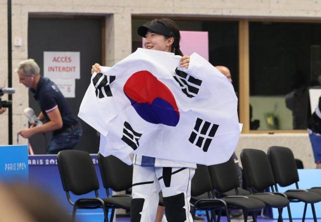 Shooter Ban hyo-jin reacts after winning gold in the womens 10-meter air rifle at the Paris Olympics in France on July 29 2024 Yonhap