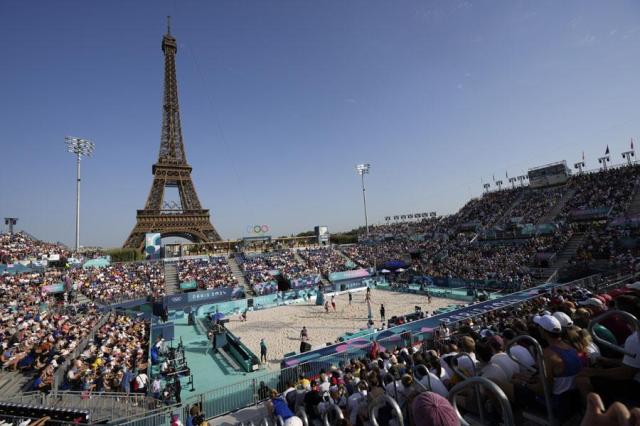 Poland takes on Australia in a beach volleyball match at Eiffel Tower Stadium 135 at the Summer Olympics in Paris France on July 30 2024 AP-Yonhap