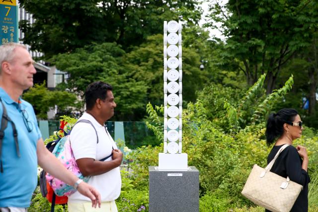 The artwork Button An Even Life by Park Yong-nam is on display at Gwanghwamun Square in Seoul on July 30 2024 AJU PRESS Kim Dong-woo