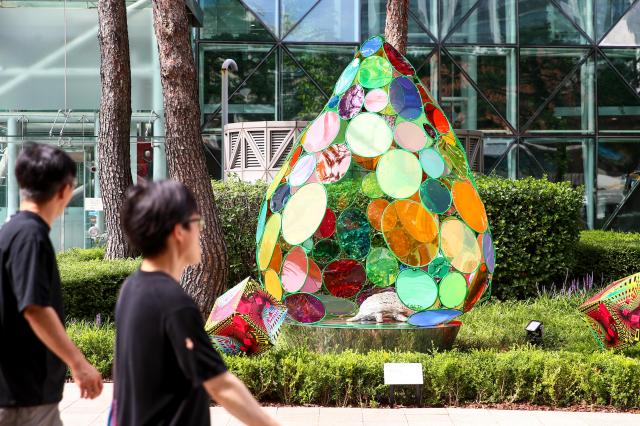 The artwork Digital Immigrants to Digital Native by Ahn Pil-yun is on display in the garden in front of Seoul City Hall on July 30 2024 AJU PRESS Kim Dong-woo