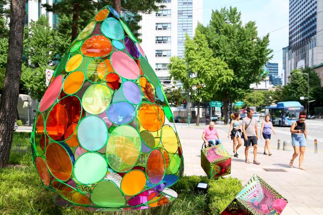 The artwork Digital Immigrants to Digital Native by Ahn Pil-yun is on display in the garden in front of Seoul City Hall on July 30 2024 AJU PRESS Kim Dong-woo