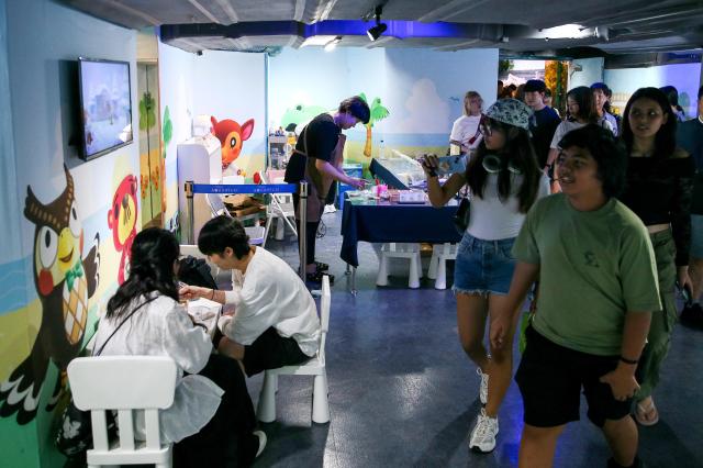 Visitors pass through the event zone at the COEX Aquarium in Seoul on July 31 2024 AJU PRESS Kim Dong-woo