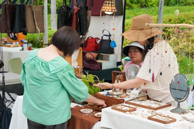 Visitors explore the design market at the 2024 Seoul City Picnic which opened on Aug 1 at the DDP in Seoul AJU PRESS Park Jong-hyeok