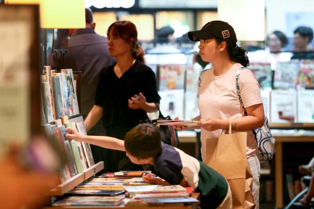 Children read books at Starfield Library in COEX Seoul on Aug 2 2024 AJU PRESS Kim Dong-woo