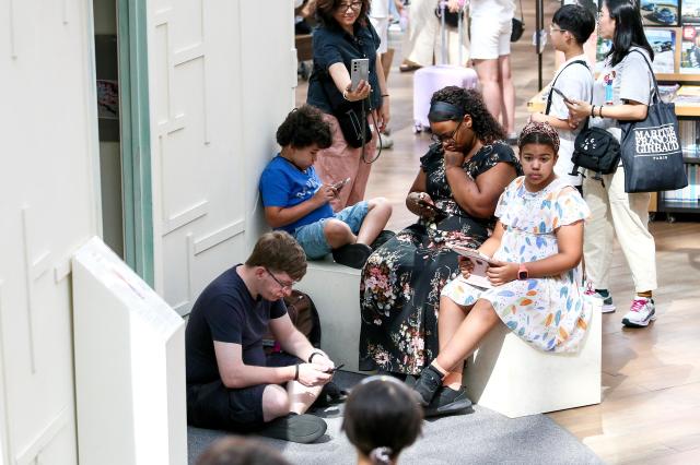 Visitors rest at Starfield Library in COEX Seoul on Aug 2 2024 AJU PRESS Kim Dong-woo