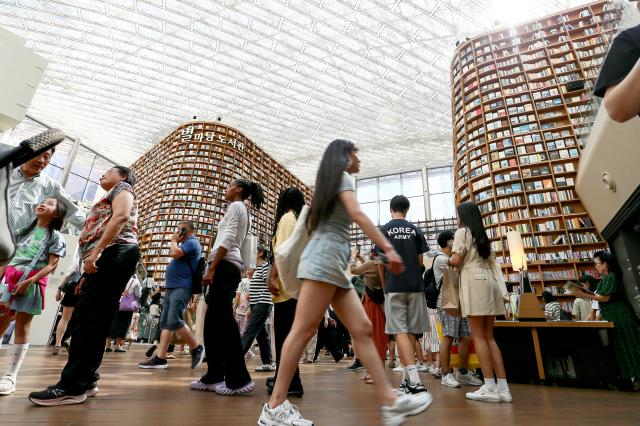 Visitors walk through the COEX Starfield Library in Seoul on Aug 2 2024 AJU PRESS Kim Dong-woo