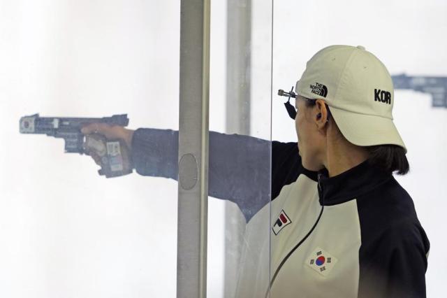 Shooter Kim Ye-ji prepares to compete in the 25-meter pistol at the Summer Olympics in Paris France on Aug 2 2024 AP-Yonhap