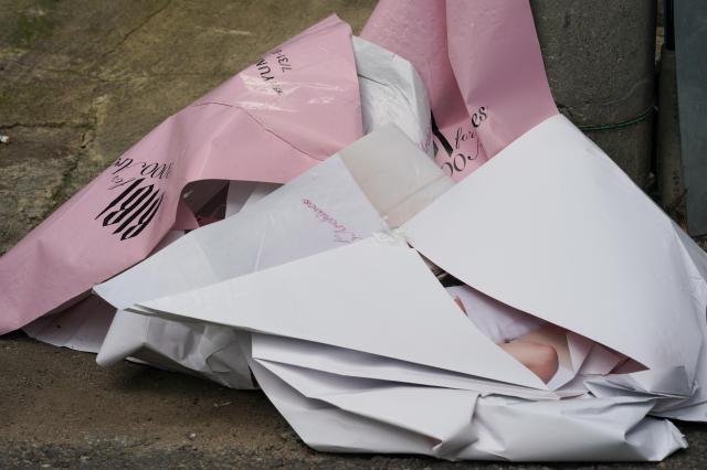 Torn posters littering the pop-up store street in Seongsu-dong on Aug 2 2024 AJU PRESS Park Jong-hyeok