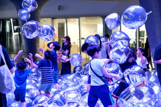 Children enjoy the Mega Boopoo event exhibition at Dongdaemun Design Plaza in Seoul on Aug 5 2024 AJU PRESS Kim Dong-woo