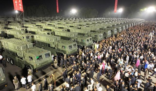 Dozens of large green military trucks are lined up during a military ceremony in Pyongyang on Aug 4 2024 in this photo released by Pyongyangs state-run Korean Central News Agency the following day