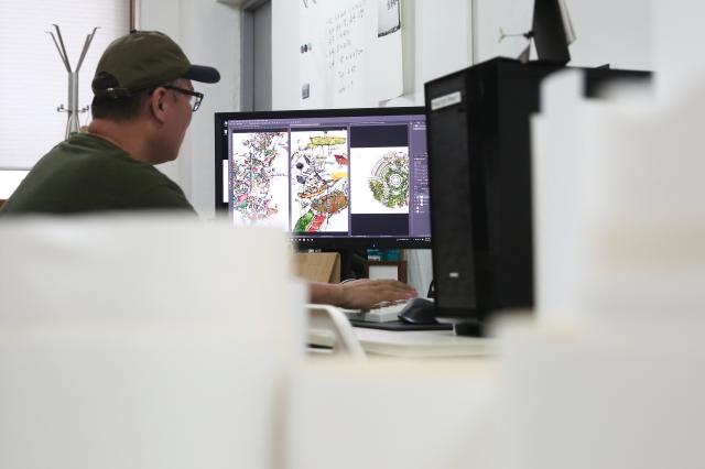 A printing industry worker edits a project for printing in Chungmuro Seoul on August 5 2024 AJU PRESS Han Jun-gu