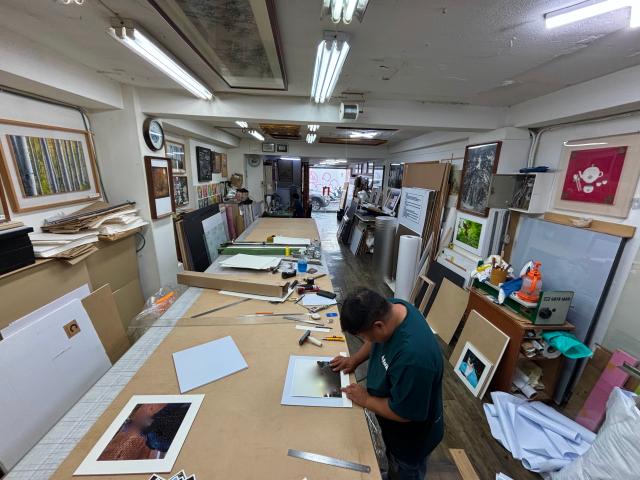 A frame shop worker frames a picture in Chungmuro Seoul on August 5 2024 AJU PRESS Han Jun-gu 