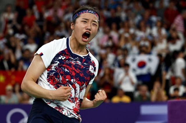 South Koreas An Se-young reacts after winning the womens singles badminton final match during the Paris 2024 Olympic Games at Porte de la Chapelle Arena in Paris on August 5 2024 AFP-Yonhap