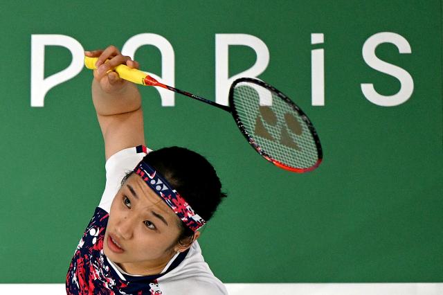 South Koreas An Se-young plays a shot to Chinas He Bing Jiao in their womens singles badminton final match during the Paris 2024 Olympic Games at Porte de la Chapelle Arena in Paris on August 5 2024 AFP-Yonhap