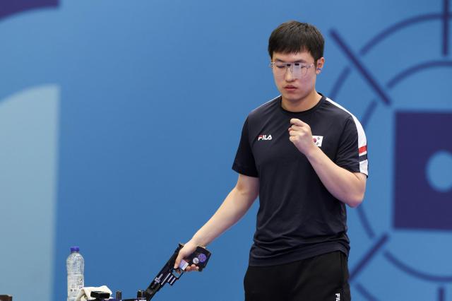 South Koreas Cho Yeong-jae takes part in the 25m Rapid Fire Pistol mens Final during the Paris 2024 Olympic Games at Chateauroux Shooting Centre on August 5 2024 AFP-Yonhap