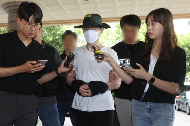 The katana perpetrator going to court for suspect interrogation on Aug. 1, 2024. Yonhap