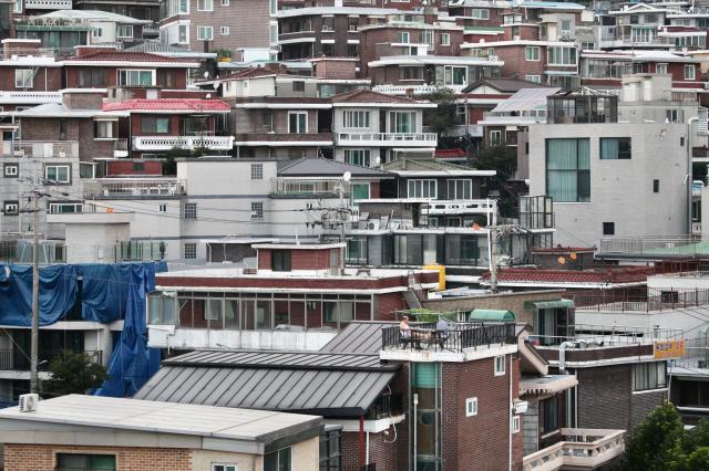 A man rests on the rooftop of a building in Haebangchon Yongsan Seoul on August 6 2024 AJU PRESS Han Jun-gu