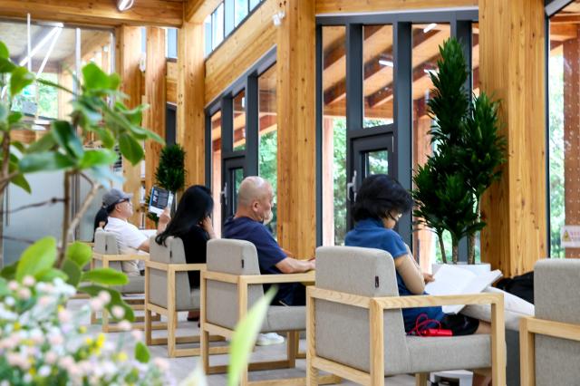 Visitors read a book at Odong Public Library in Seongbuk-gu Seoul on Aug 7 2024 AJU PRESS Kim Dong-woo