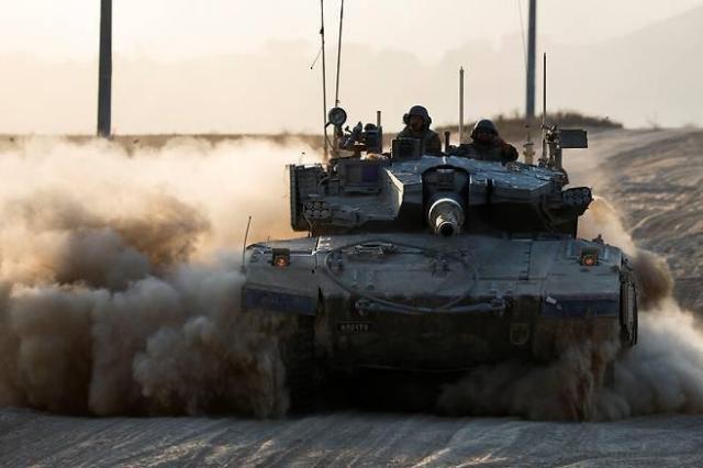 A tank moves close to the Israel-Gaza border during the ongoing conflict between Israel and Hamas in Israel on Aug 7 2024 Courtesy of  REUTERS