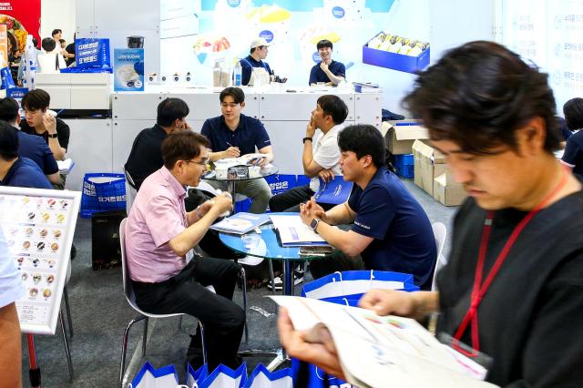 Visitors receive consultations at the 74th World Franchise Expo held at COEX in Seoul on Aug 8 2024 AJU PRESS Kim Dong-woo